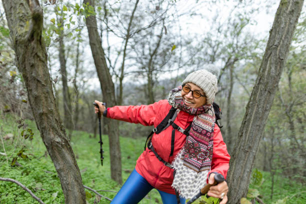 istock Smiling woman enjoying a hike in the forest 2186797869