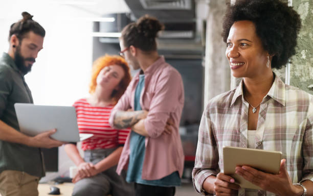 istock Group of business people and software developers working as a team in office 2186806454