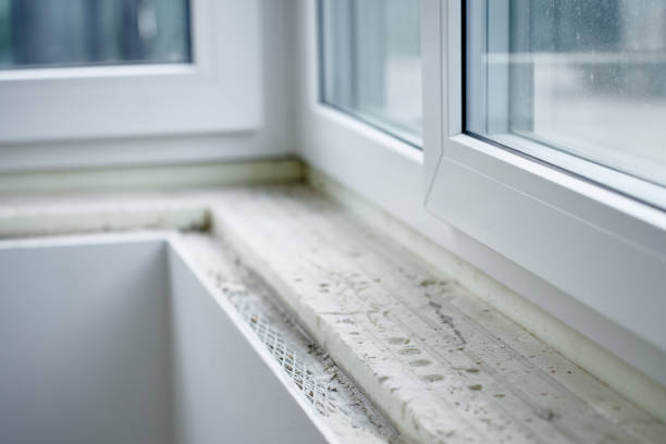 istock Renovation in new apartment. Installing sill in PVC window 2186810468