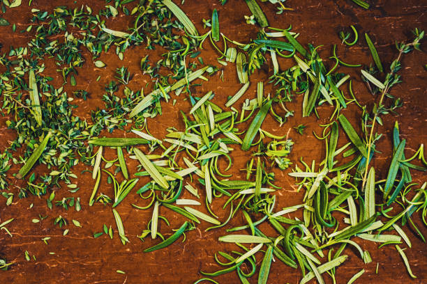 Tray of Rosemary and Thyme on a baking sheet ready to go in the oven.