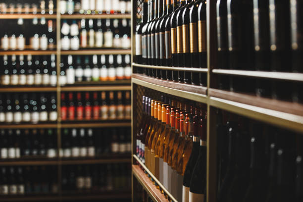 istock Well-Stocked Wine Cellar Shelves Lined With Diverse Bottles 2186812945