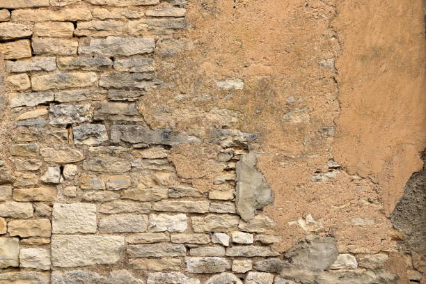 istock yellow beige sand color stone brick vertical wall 2186814425