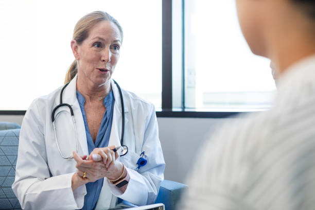 istock Pediatrician has important conversation with male patient 2186814659