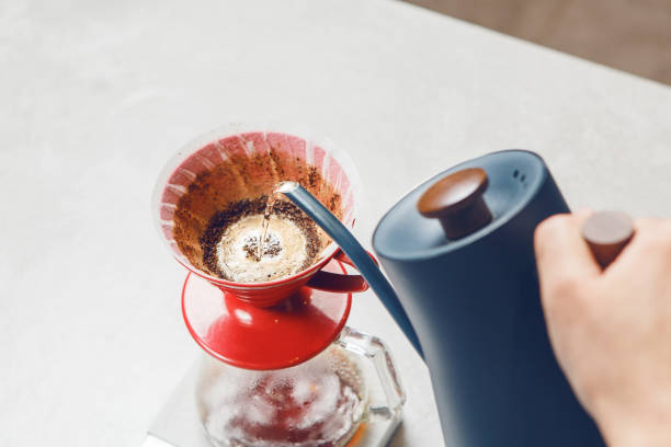 istock Person Pouring Coffee Into Pour Over V60, Close-up 2186816771