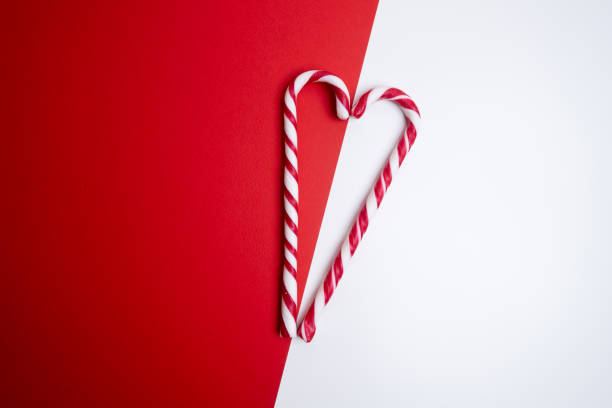 istock Christmas background with candy canes. Poster, banner, greeting card template. Festive backdrop. Holiday season. Xmas frame 2186818292