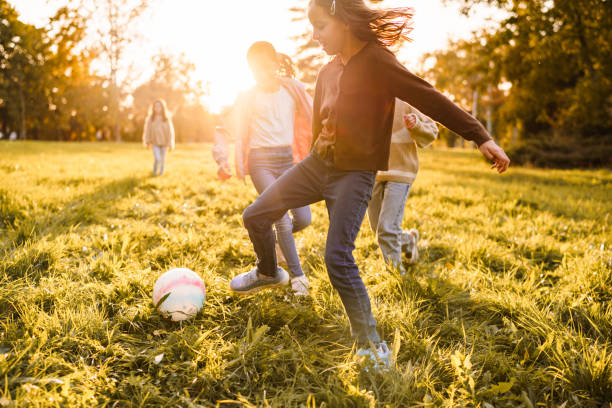 istock Children playing soccer on a meadow 2186818841