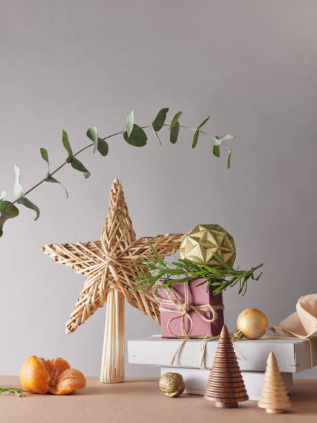 istock Creative still life with holiday decorations and gifts. Neutral background, copy space 2186821596