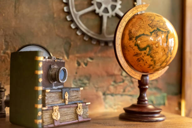 Shelf with vintage objects with globe and books, symbolizing science and history