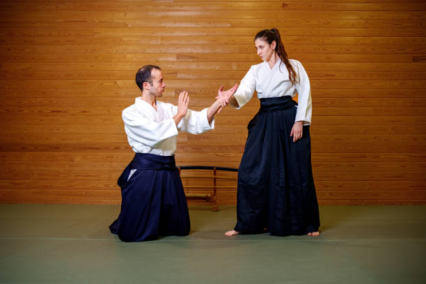 istock Training: Martial Arts Demonstration in Traditional Uniforms 2186825229
