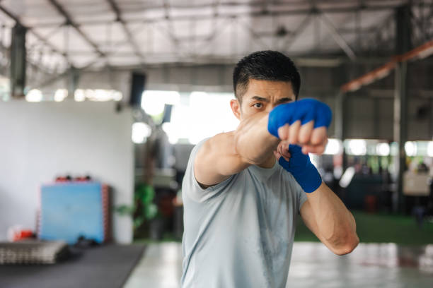 istock Strength in Focus: The Chinese Kickboxer’s Journey 2186827148