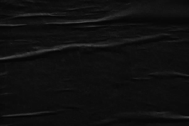 istock Dark black blank paper backgrounds creased crumpled surface old torn ripped posters grunge textures placard 2186832086