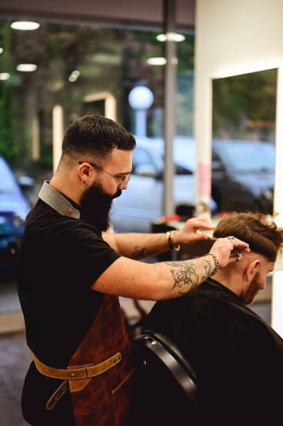 istock Mid adult man getting a modern haircut. 2186836836