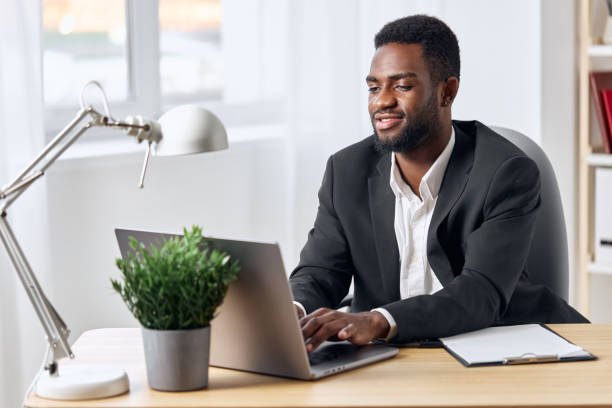 istock man education american computer technology student job african office laptop freelancer online 2186839076