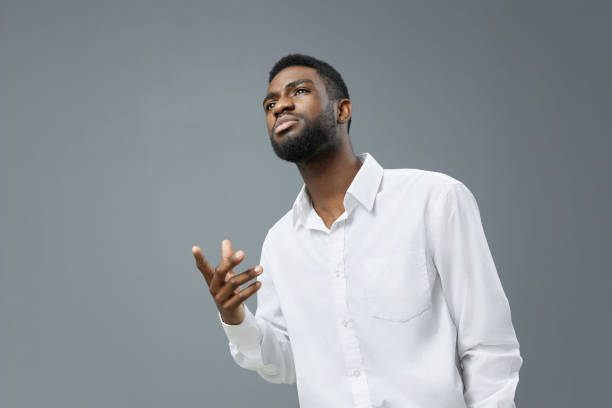 istock man happy american white black copy shirt space young smile standing studio african 2186839293