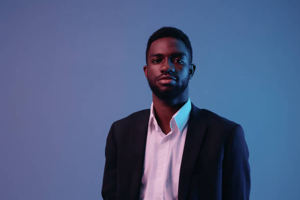 istock man neon art light portrait model studio businessman color american expression 2186841347