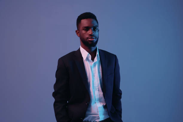 istock man color portrait studio art neon dark expression businessman model light 2186841714