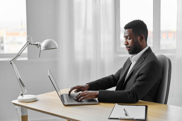 istock african man freelancer education job laptop office online computer student american cyberspace 2186841733