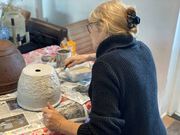 istock Retiree Woman working on her hobby 2186842074