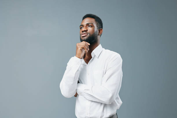 istock man standing smile copy happy studio american human space young shirt african white 2186842452