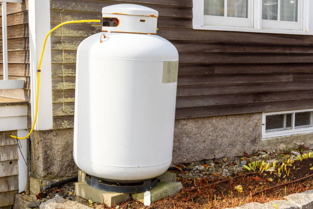 istock Propane cylinder against the external wall of a house 2186844164