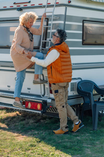 istock Senior couple embarking on road trip with camper van 2186847420