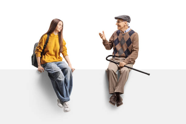 istock Female student sitting on a panel and listening to wise elderly man 2186847952