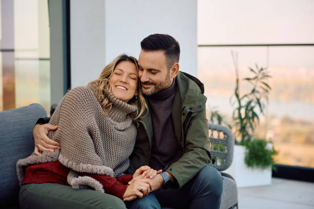 istock Loving couple enjoying in time together while relaxing on a terrace. 2186856030