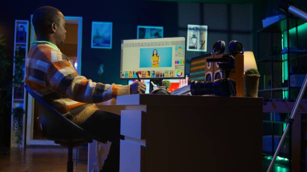 istock Creative african american graphic designer editing images on dual monitors 2186859168