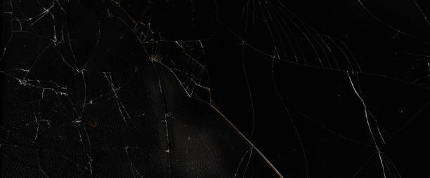 istock The pattern on the glass is cracked.  damage to the glass.  cracked texture 2186861419