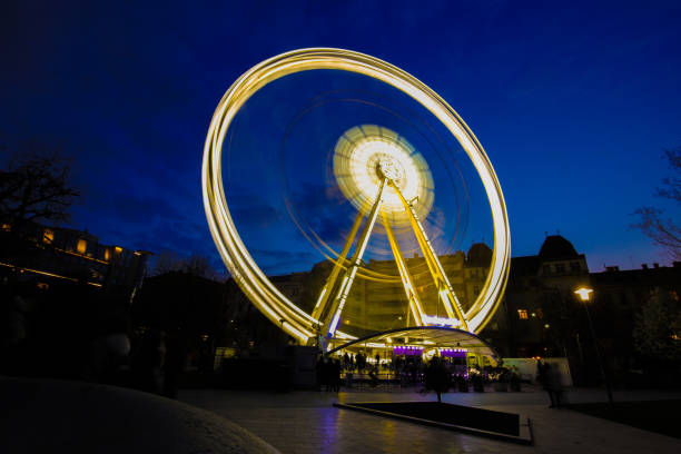 istock Budapest Ferris wheel in motion at night 2186863852