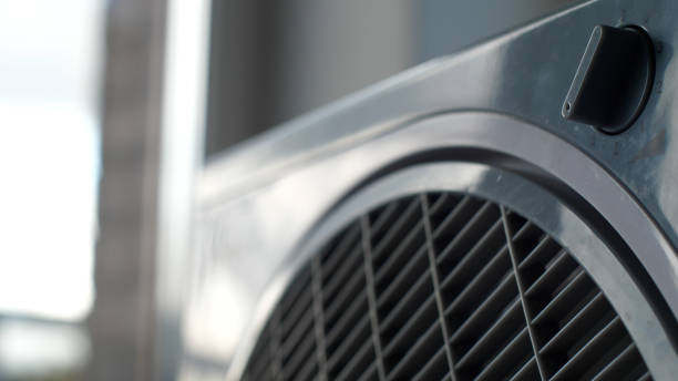 istock Close up of a small home fan switched on maximum speed 2186865103
