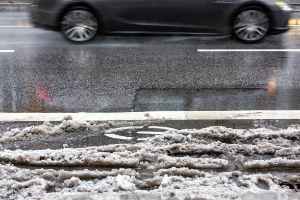 Snow slush on the cycle lane on a main road in Hamburg