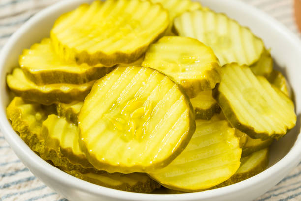 Homemade Organic Dill Pickle Slices in a Bowl