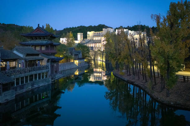 Beijing, China - Oct 22nd, 2024: Scenic view of Gubei Water Town during the blue evening hour. A famous travel destination.