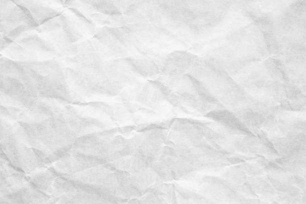 istock Abstract white crumpled and creased recycle craft paper texture background 2186876109
