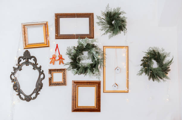 istock Festive wall decoration with frames and wreaths for holiday gatherings 2186876904