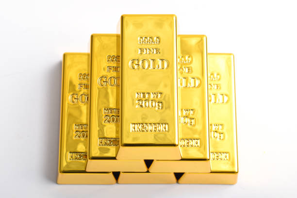 Stack of shiny gold bars isolated on white background, Top view