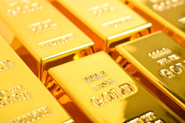 istock Close up of Many shiny gold bars as background 2186887652