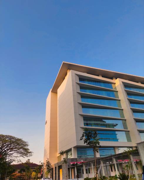 istock high rise building with blue cloud background. building for lectures 2186892540