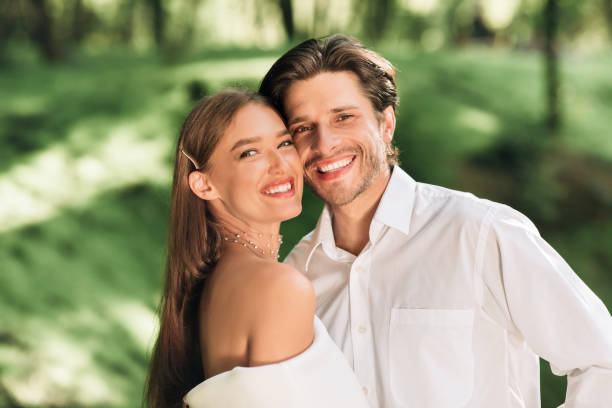 istock Joyful Wedding Couple Hugging Posing In Beautiful Park 2186893858