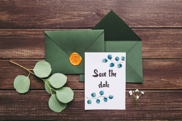 istock Craft green envelopes with beautiful postcard with invitations 2186894504
