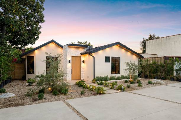istock Modern house with landscaped yard at sunset. 2186896401