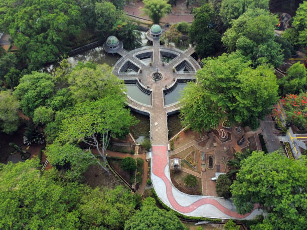 istock Aerial View of Circular Building Surrounded by Trees 2186900487