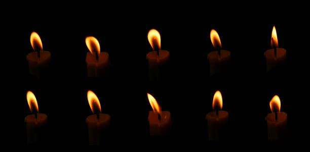 Candlelight and flame Black illustration lights with dark background at night, bright celebration, a funeral with death in a cemetery.