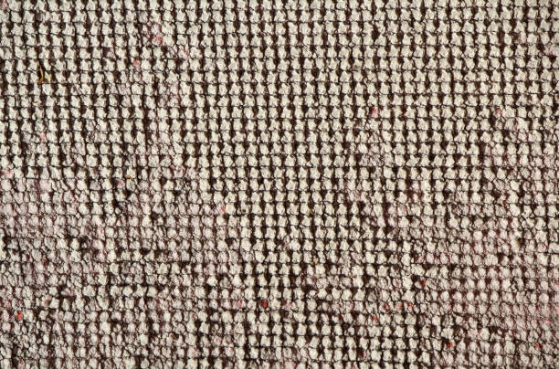istock Beige rough honeycomb-like textured abstract background 2186901337