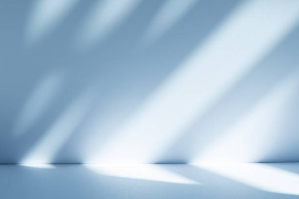 istock Studio style background wall decoration presentation uses white and blue tones. with shadows cast from a nearby window, concept creating a decorative 2186904703