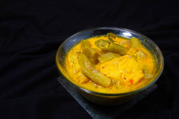 istock sayur lodeh in a bowl on a black background. 2186905171