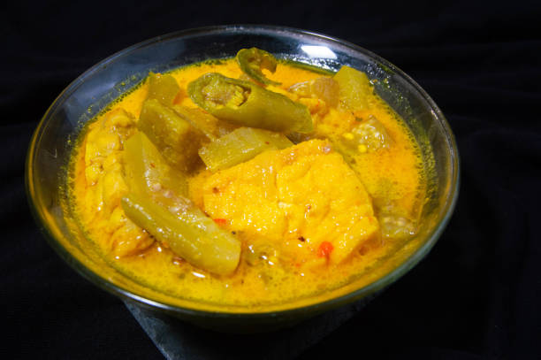 istock sayur lodeh in a bowl on a black background. 2186905174