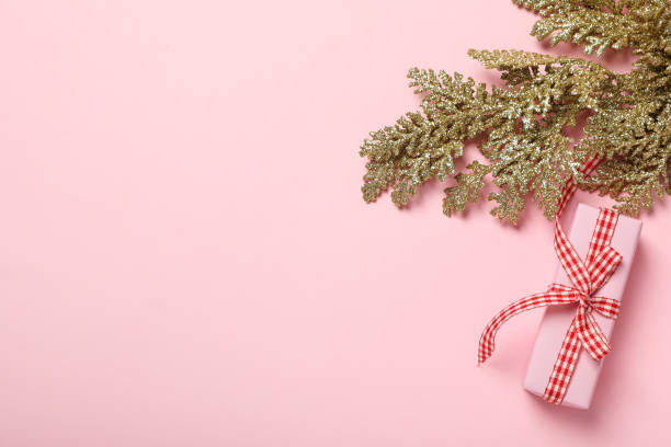 istock Gift box and decoration on pink background, space for text 2186907483