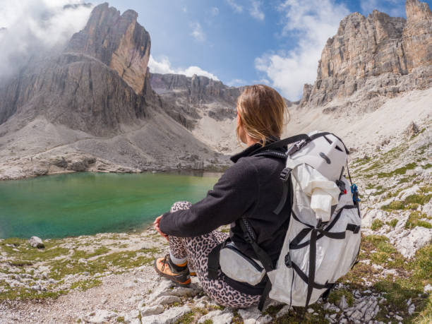 istock Contemplation by the Alpine Lake, Dolomites 2186907727